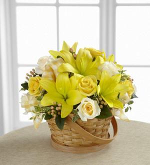 The FTD® Sunny Surprise™ Basket Flower Bouquet
