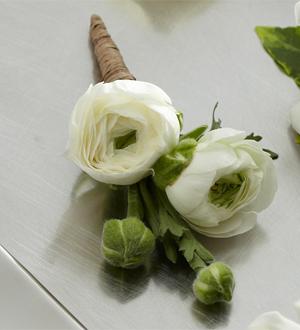 The FTD® White Ranunculus Boutonniere